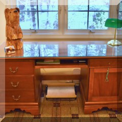 F30. Lexington Furniture by Betsy Cameron desk with a glass top. One knob missing. 30” x 62” x 24” - $395 